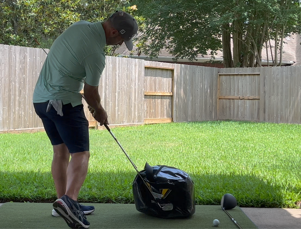 Golfer Geek at Impact in his favorite swing drill